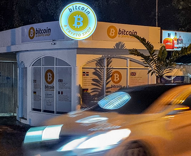 Image of bitcoin shop with light up orange sign
